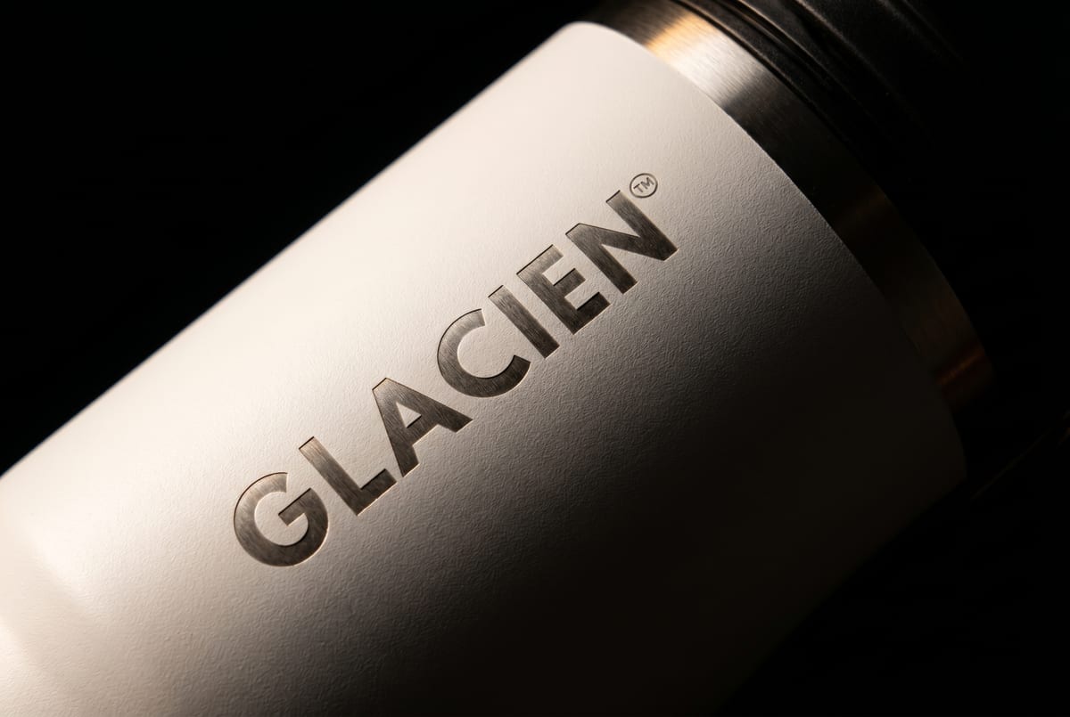 The GLACIEN wordmark, engraved into matte steel